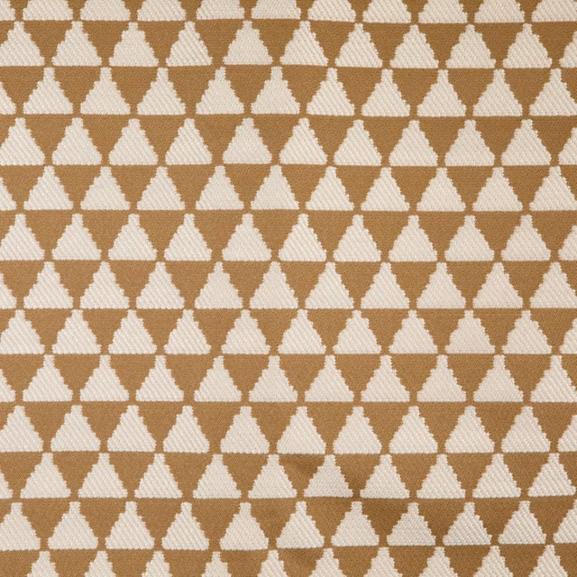 Warm camel and ivory woven fabric with a small repeating geometric diamond motif