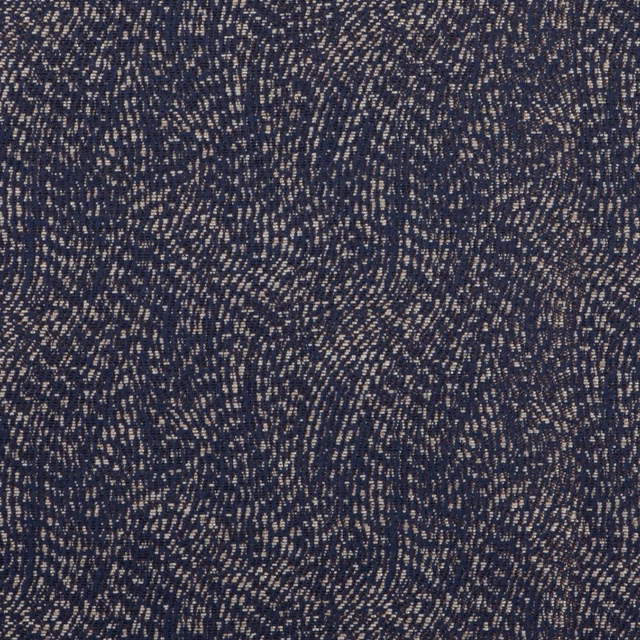 Close-up of deep indigo woven fabric with taupe flecks and irregular vertical texture
