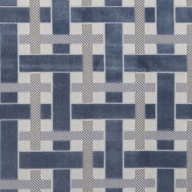 Ink-blue and ivory interlocking geometric weave with fine diagonal hatch detailing