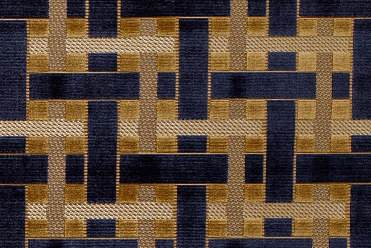 Deep indigo and ochre interlocking blocks in a textured woven fabric