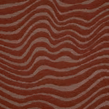 Rust terracotta textile with taupe-grey undulating lines and a tactile woven surface