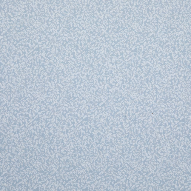 Pale Ciel blue fabric with a fine, frosted botanical pattern