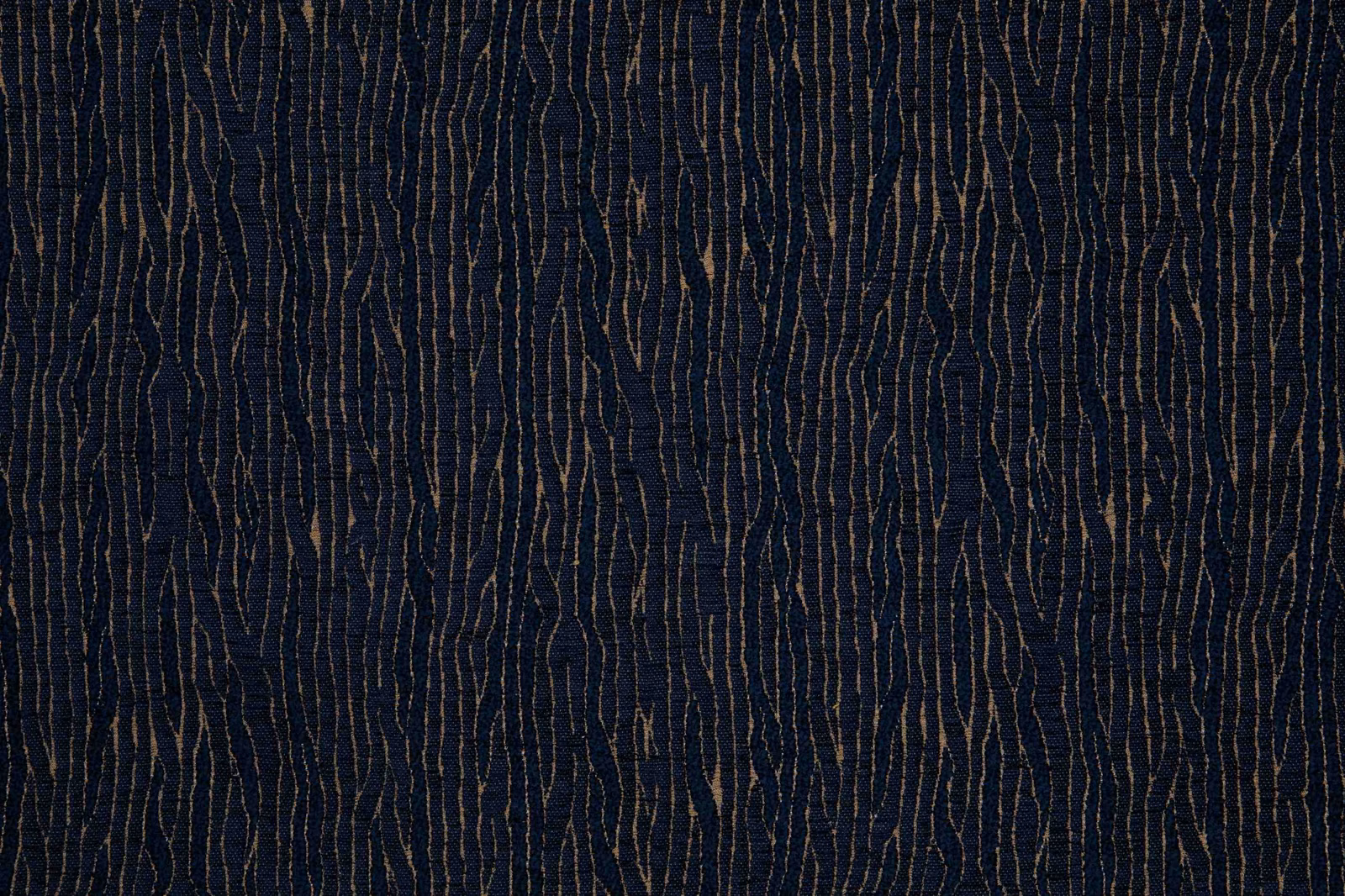 Midnight-blue woven ground with irregular ochre vertical lines and subtle texture