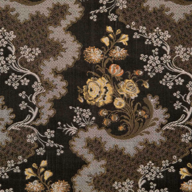 Olive-black woven ground with scalloped stone-grey bands and antique gold flowers