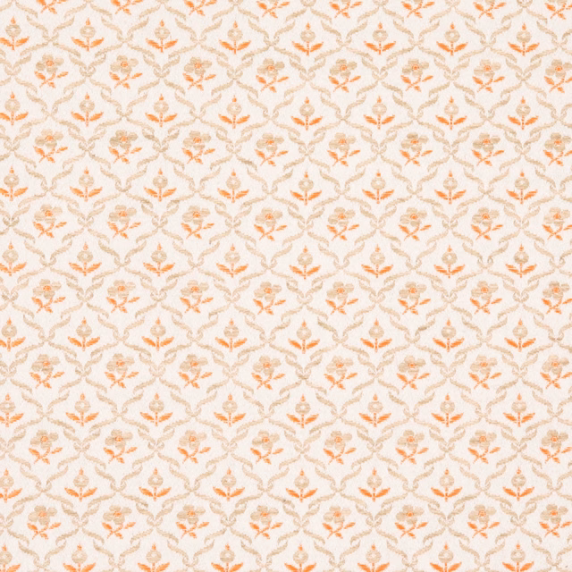 Cream textile with a small repeating peach floral lattice and subtle woven texture