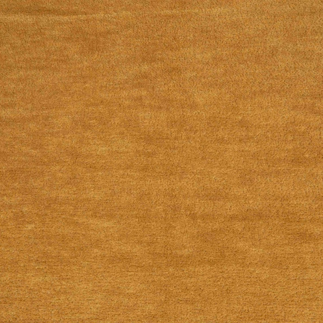 Warm golden-ochre textile with fine horizontal mottling and a softly textured woven surface