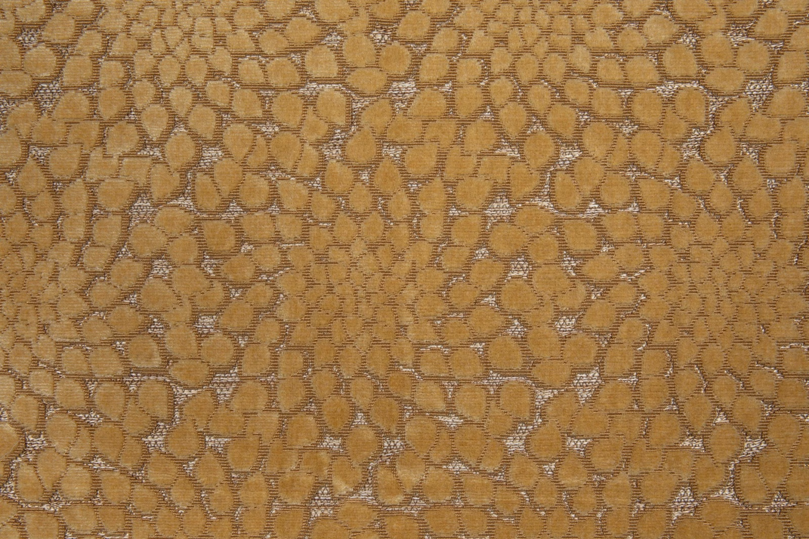 Warm ochre-gold woven textile with taupe outlines and rounded pebble-like motifs