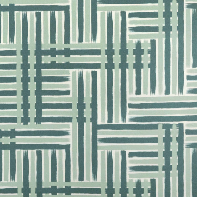 Celadon and ivory geometric textile with interlocking linear blocks and subtle weave texture.