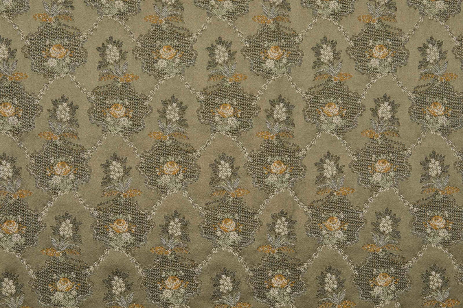 Muted kaki-olive woven fabric with repeated floral bouquets and softly contrasting outlines