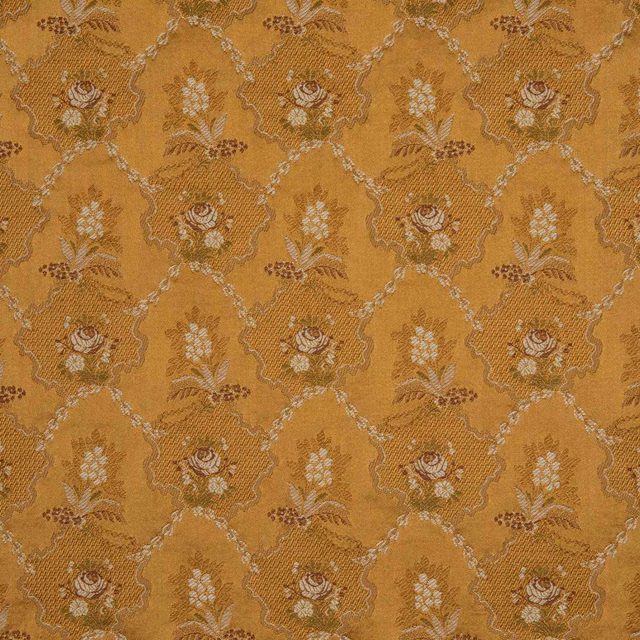 Warm ochre-gold floral trellis fabric with muted rust, cream and brown woven details