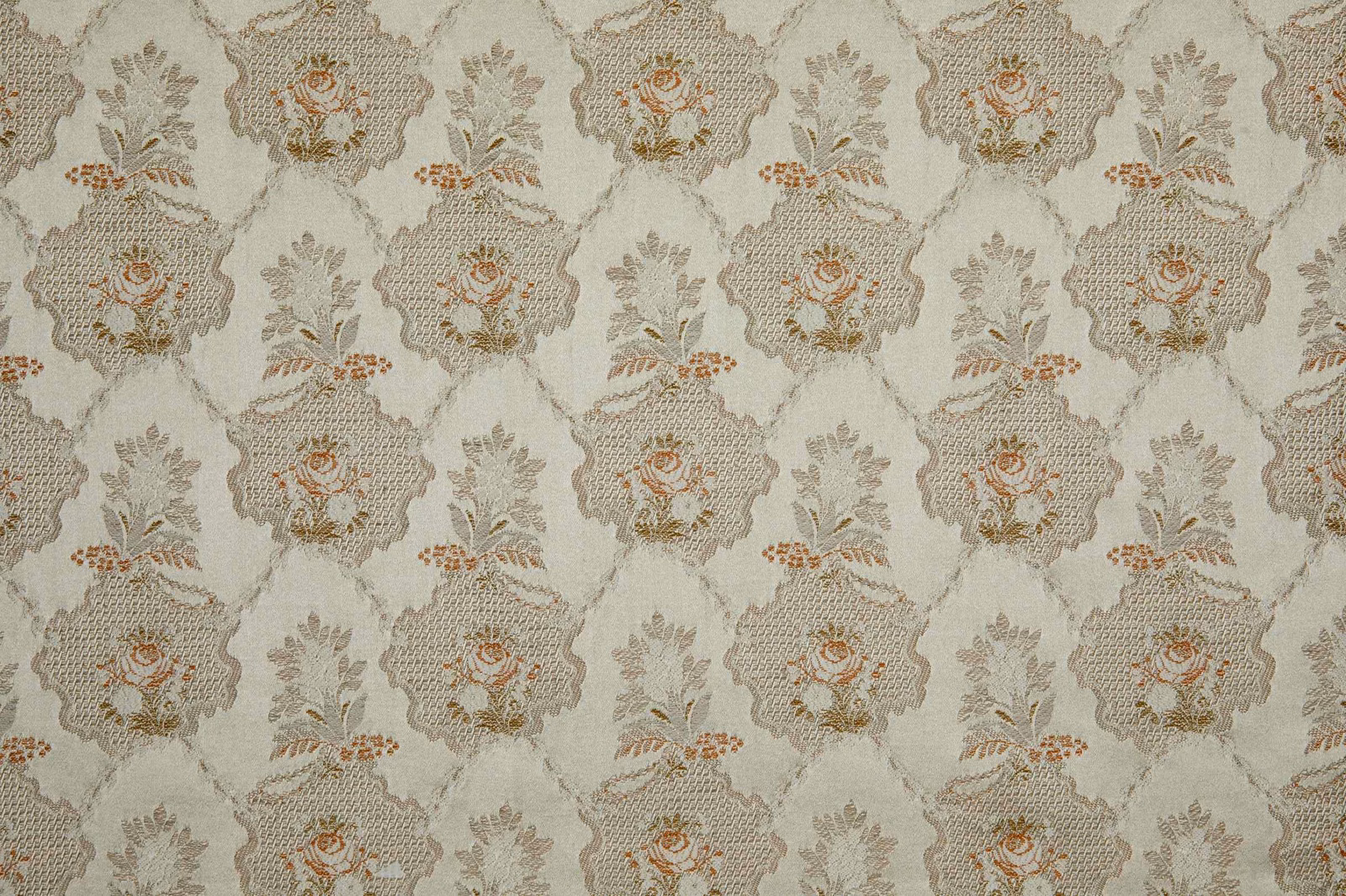 Pale beige woven floral lattice with grey-green foliage and rust flower accents