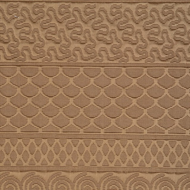 Warm camel woven textile with layered geometric bands and tactile raised pattern