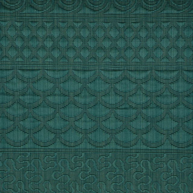 Deep teal woven fabric with scalloped bands and linked geometric motifs