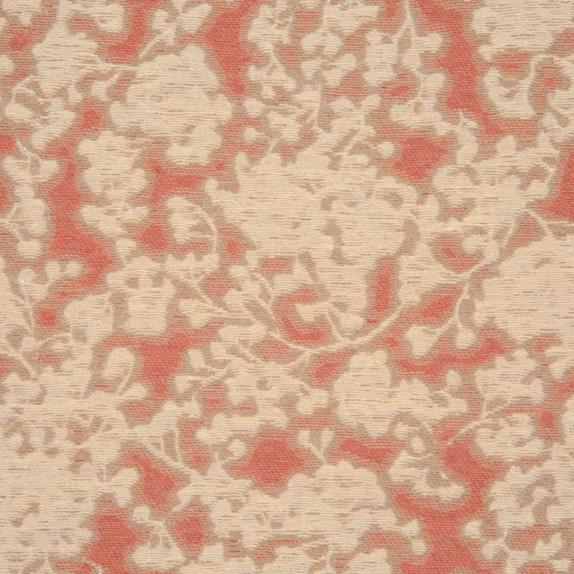 Muted coral and cream ornamental textile with taupe outlines and visible woven texture