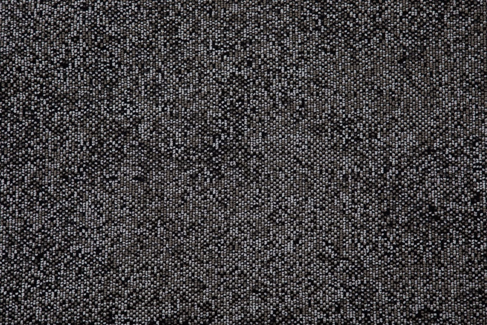 Charcoal-grey Punti fabric with dense black, silver and pale grey flecked weave