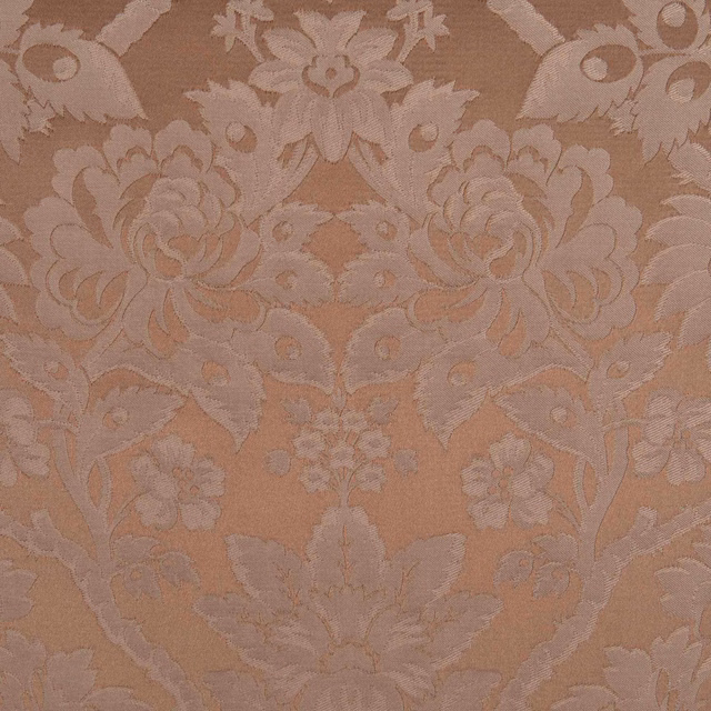 Muted vieux rose damask with pale blush floral motifs and softly raised woven texture