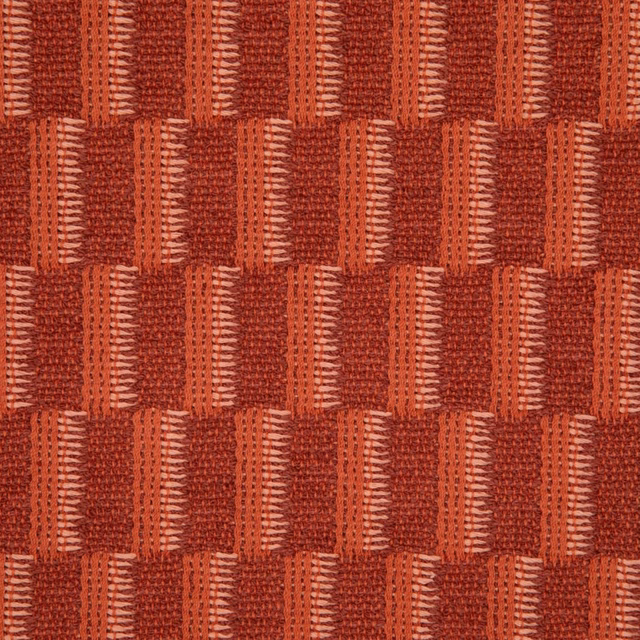 Deep terracotta woven fabric with staggered red blocks and ribbed vertical texture