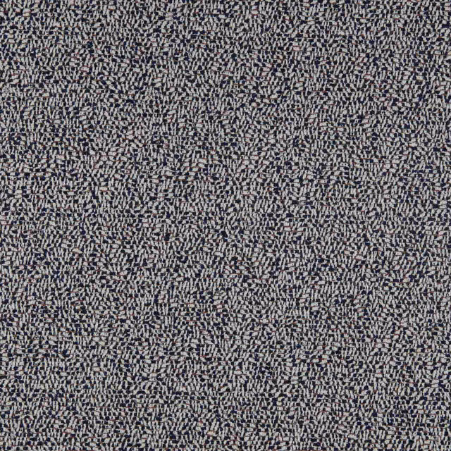 Deep ink-blue textile with dense ivory-grey broken flecks and a softly nubby weave