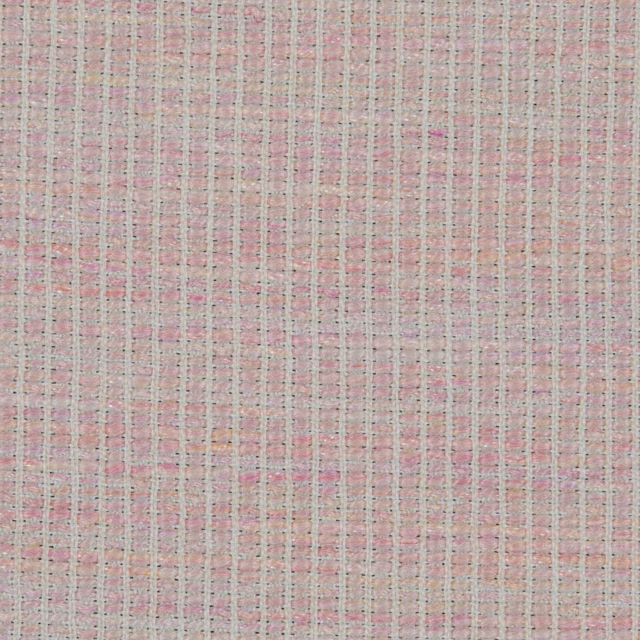 Close-up of sorbet pink woven fabric with pale cream crosshatch texture