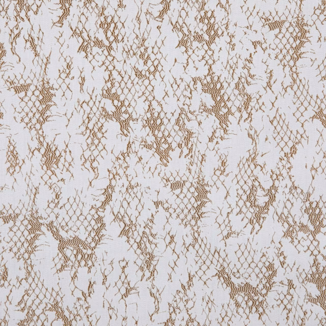 Warm camel fragmented lattice on a pale cream, lightly textured textile