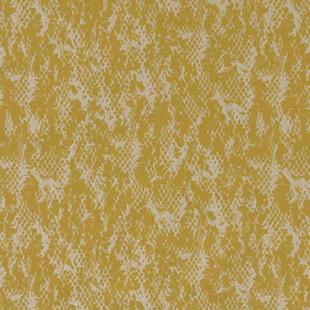 Mustard ochre fabric with pale distressed organic tracery and a softly textured surface