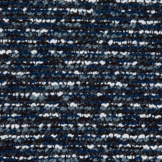 Close-up of inky navy woven fabric with white and grey horizontal flecks