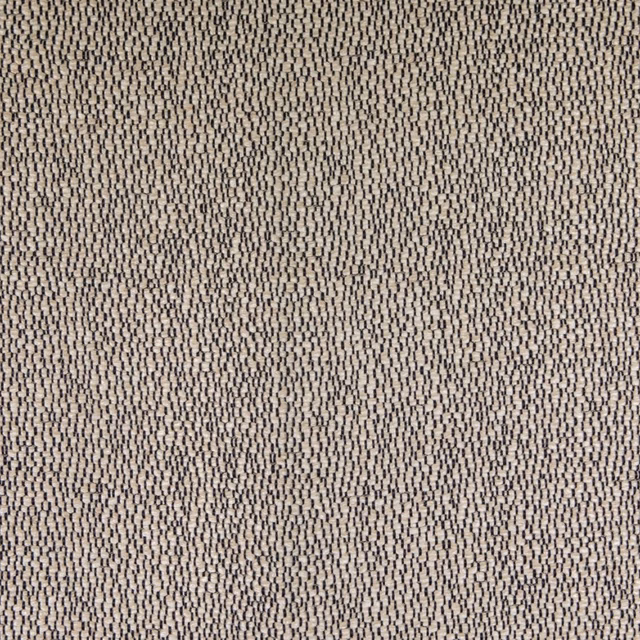 Close-knit granite-grey textile with charcoal flecks and a softly variegated surface