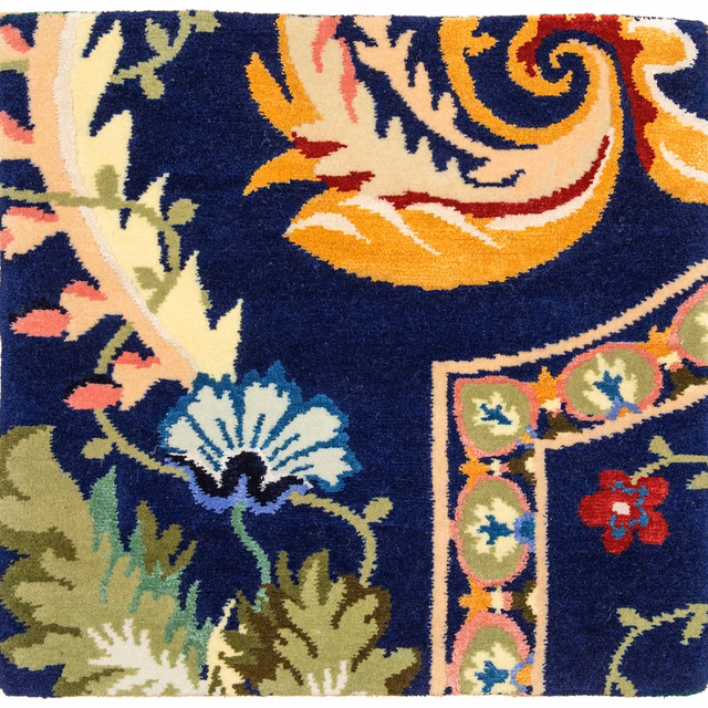 Deep navy pile with oversized cream paisley, blue flower and ochre foliage