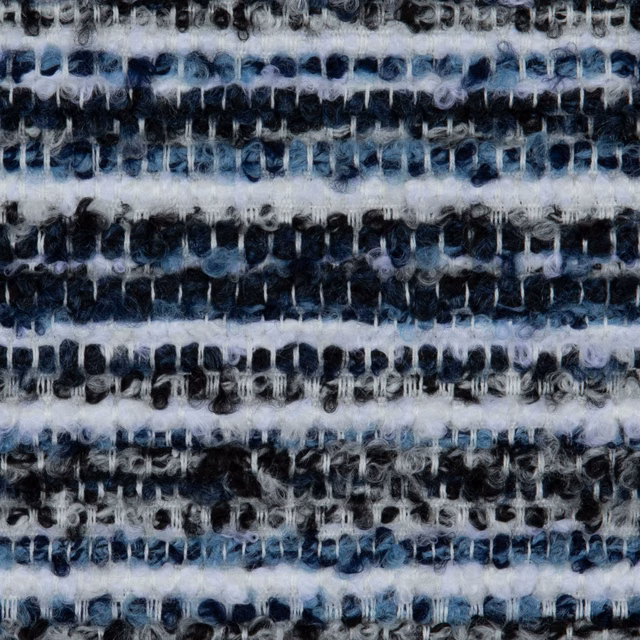Close-up of ink-blue and ivory irregular striped fabric with chunky looped texture