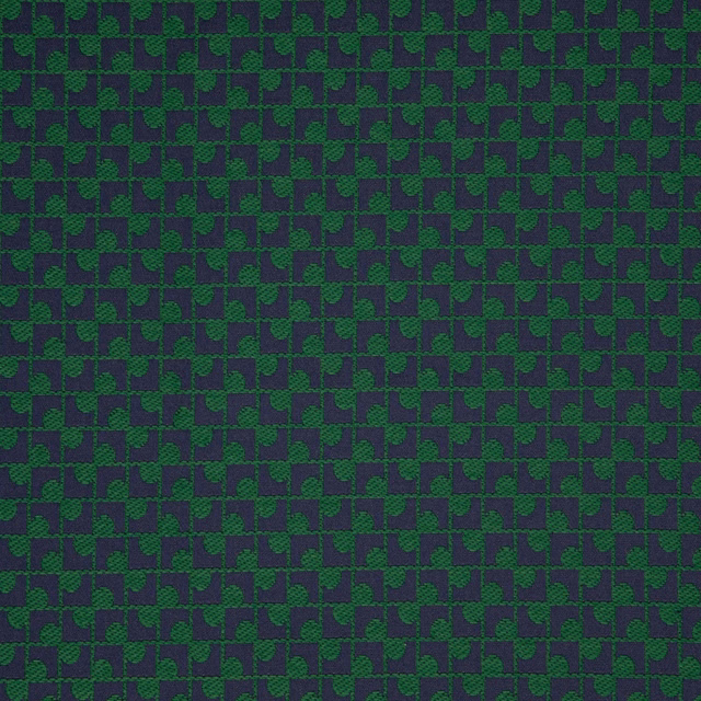 Dark forest-green textile with a tiny interlocking geometric weave and subtle texture