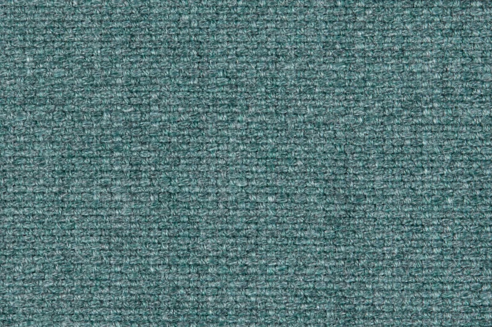 Close view of muted agave teal fabric with a nubby, irregular weave