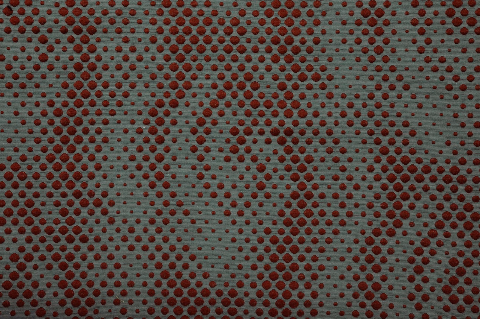 Muted aqua woven ground with evenly spaced rouge oval dots