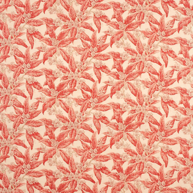 Cherry-red leafy botanical clusters with fine detail on a warm cream fabric ground