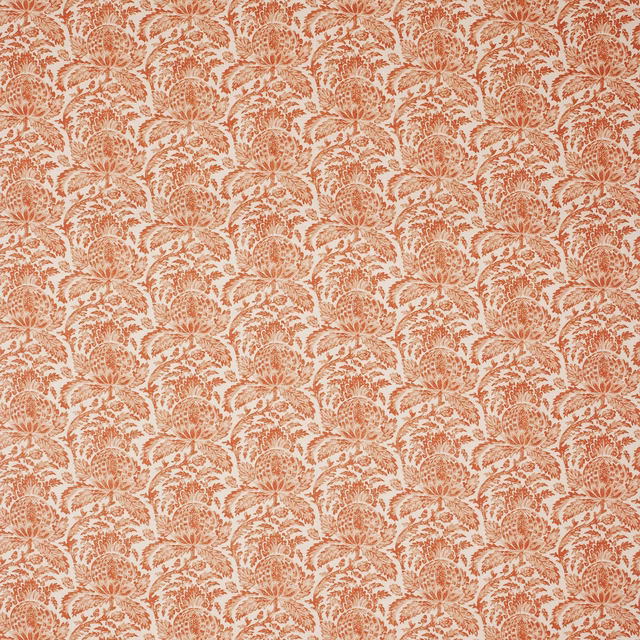 Russet terracotta floral and leafy repeat printed on a pale blush-cream fabric