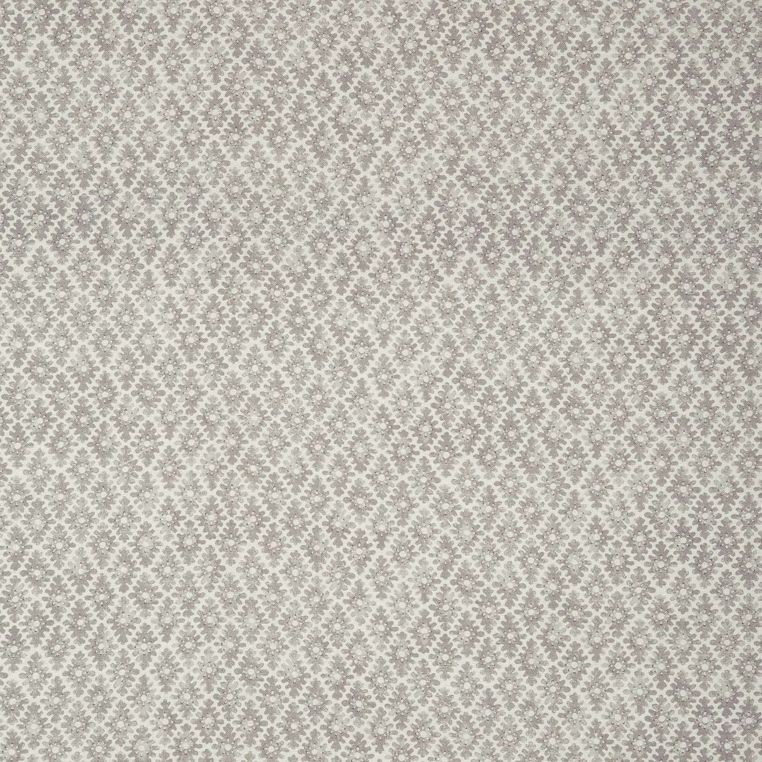 Pale dove-grey and ivory fabric with a small repeating ornamental floral motif