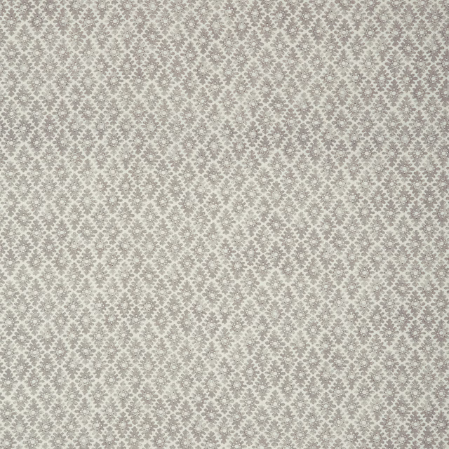 Pale dove-grey and ivory fabric with a small repeating ornamental floral motif