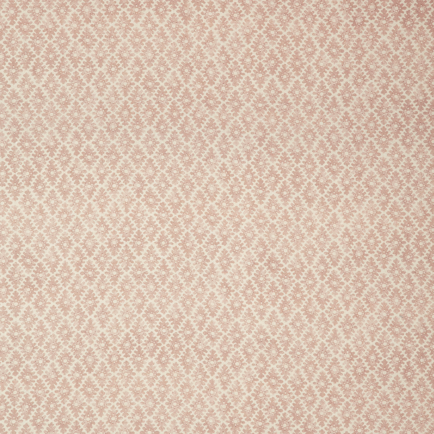 Soft blush-pink fabric with a dusty-rose small-scale repeating ornamental weave