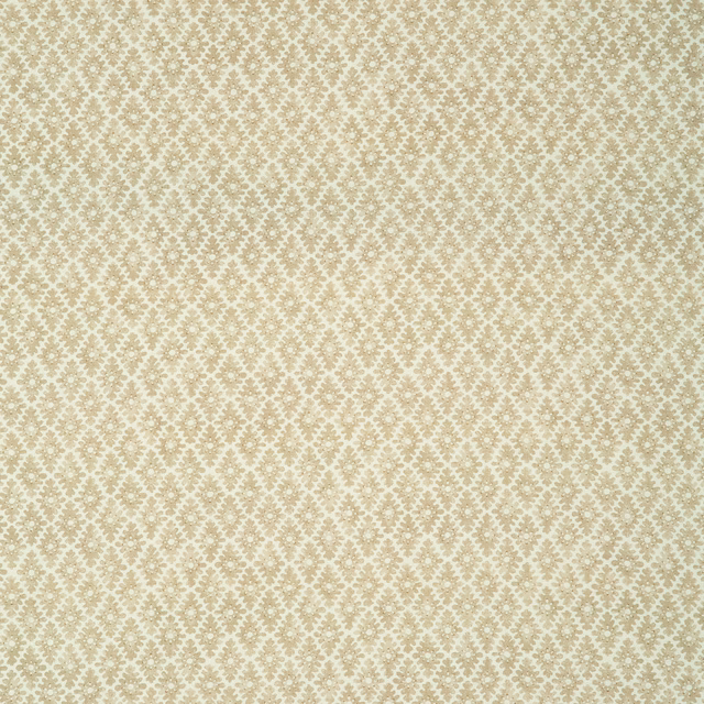 Warm wheat-beige fabric with tiny cream floral diamonds in a close repeat