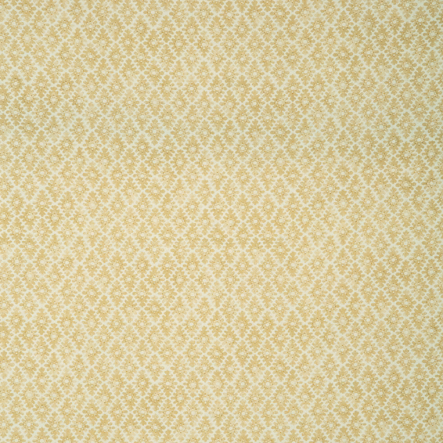 Pale maize-gold linen with a small repeating trellis and floral dot pattern