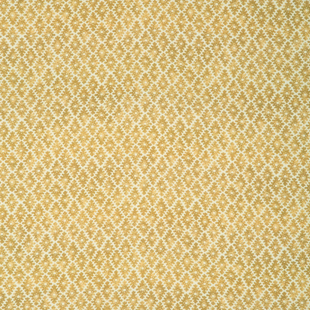 Warm marigold linen with a tiny cream trellis and dotted floral texture