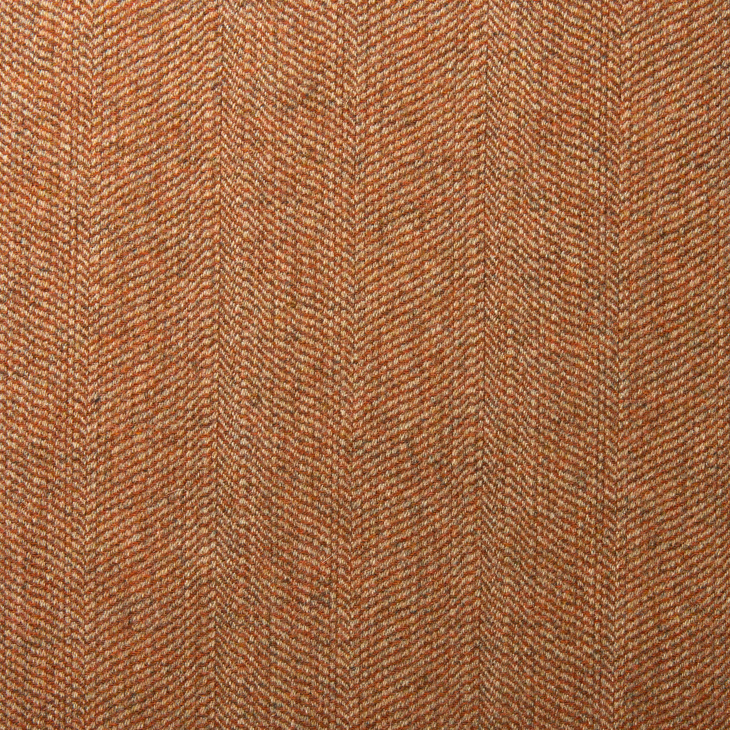 Warm rust and brown wool with a fine, tactile herringbone weave