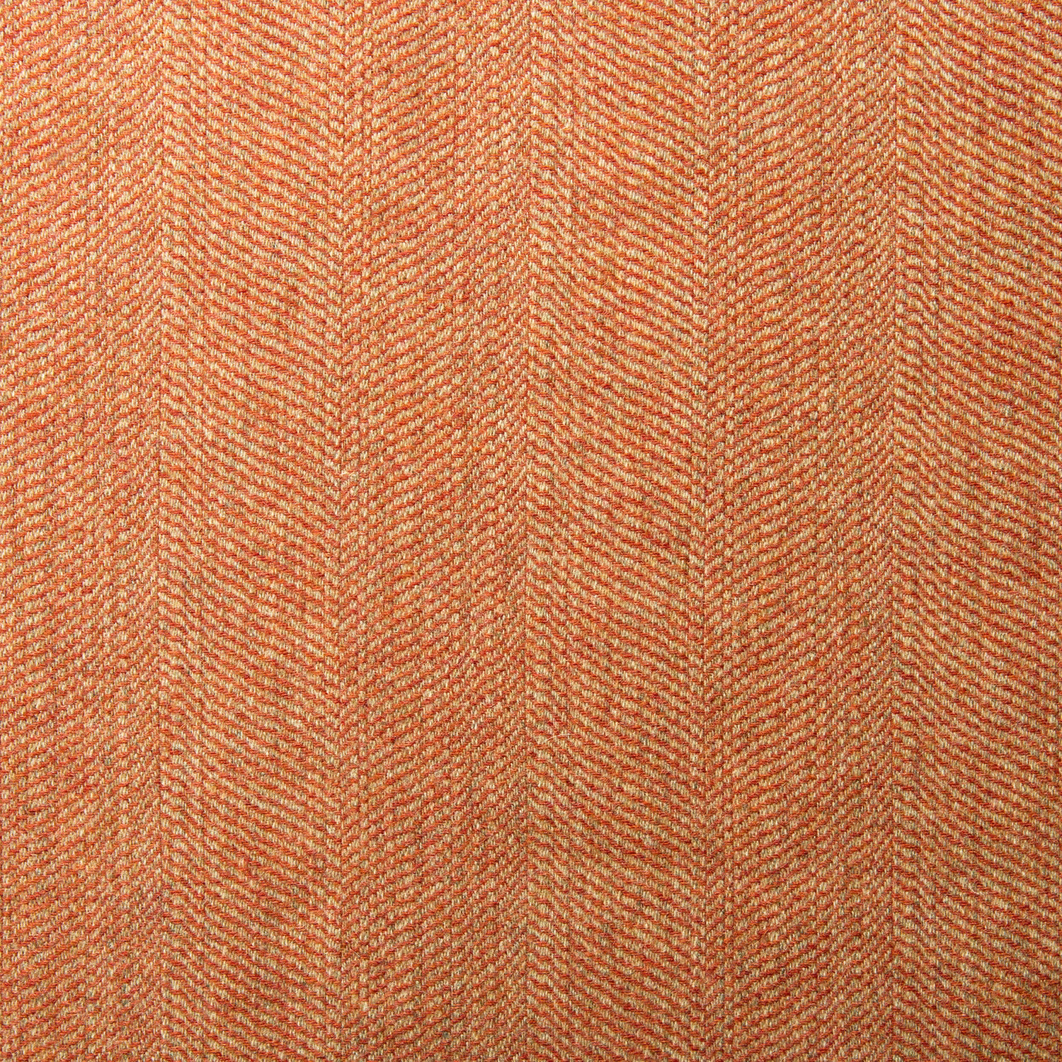 Warm coral-rust wool swatch with a fine tactile herringbone weave
