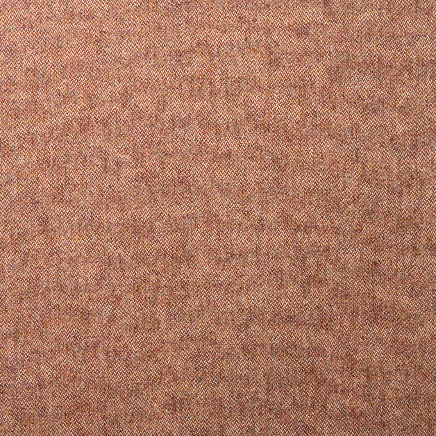 Close-up of warm brick-red wool with subtle russet flecks and fine woven texture
