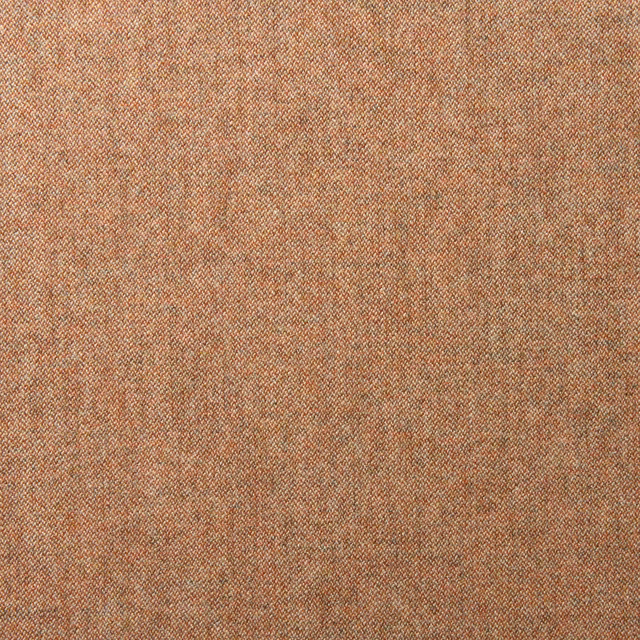 Close-up of warm ember terracotta wool weave with fine oatmeal flecks and diagonal texture