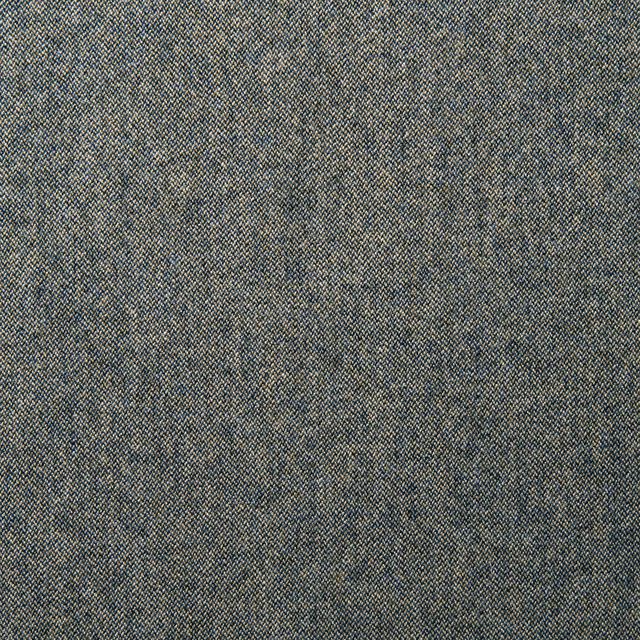 Close-up of muted indigo blue wool weave with fine grey and oat flecks