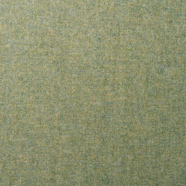 Close-up of lime green wool weave with fine aqua and blue flecks