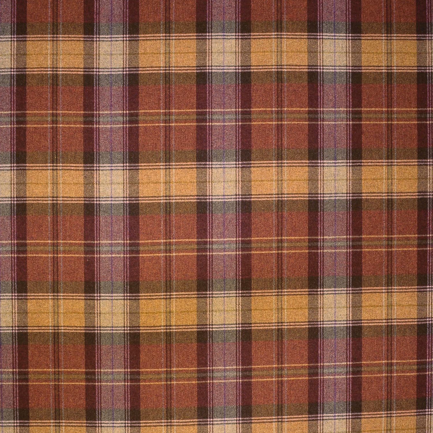 Muted terracotta wool plaid with ochre, cream and plum woven checks