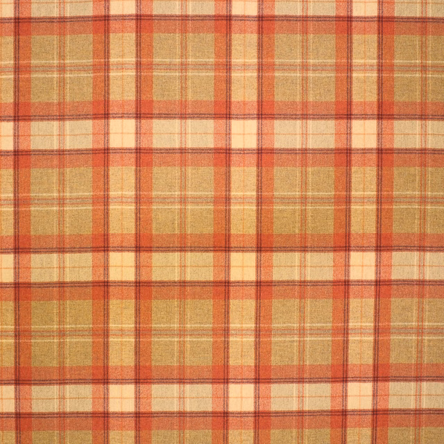 Warm camel plaid fabric with cream and rust-red woven checks and softly brushed texture