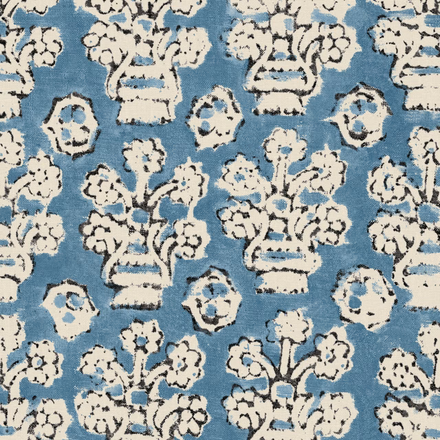 Lakeside blue fabric with ivory floral urns and distressed black outlines
