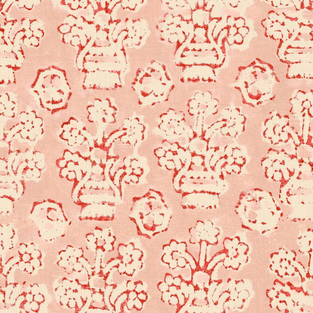 Blush pink fabric with distressed red floral baskets, bouquets and scattered blooms